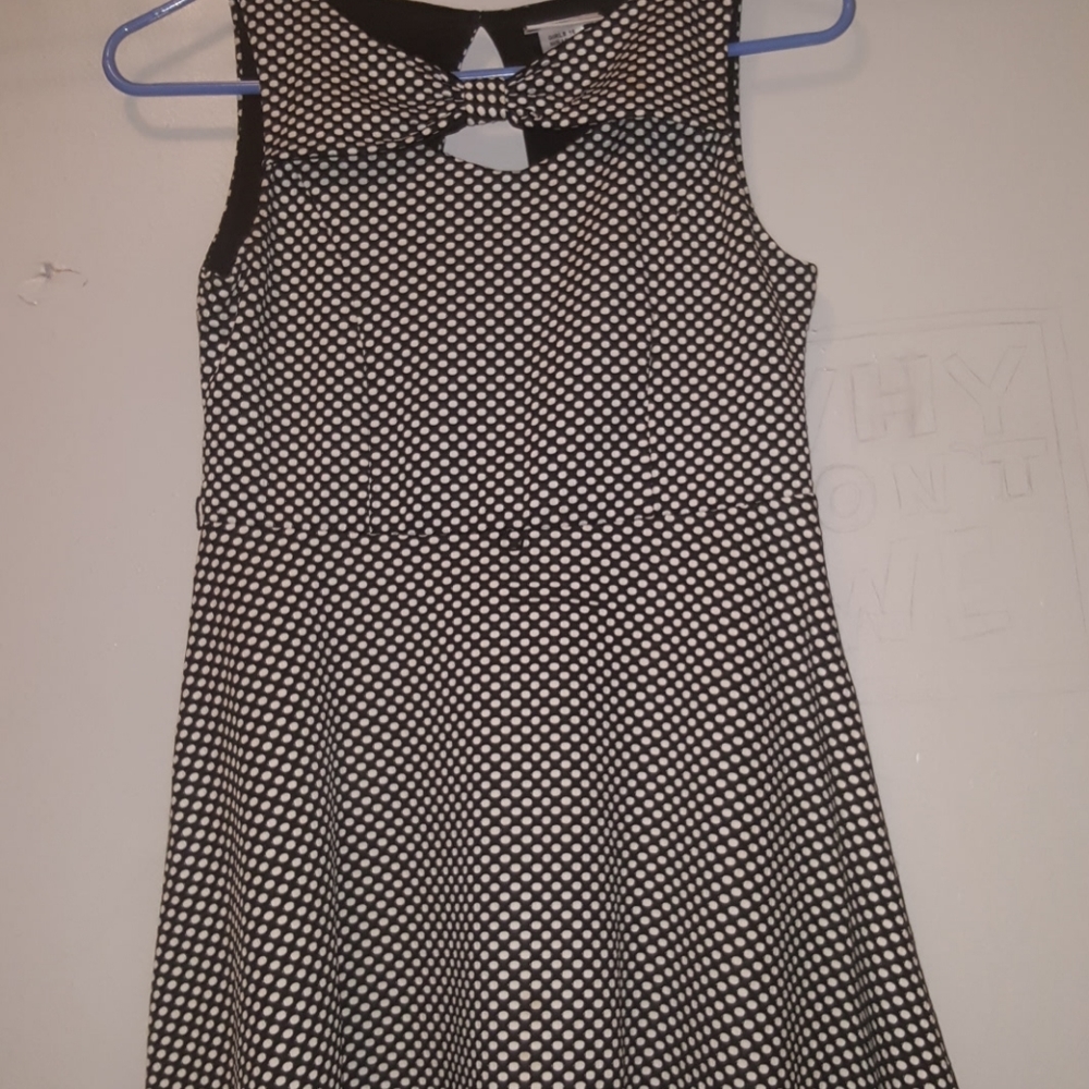 Black and white bow neckline dress